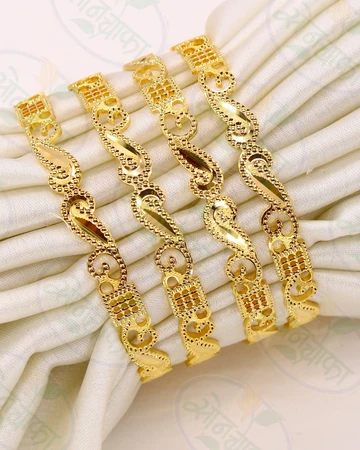 Twisted Design Gold Bangle